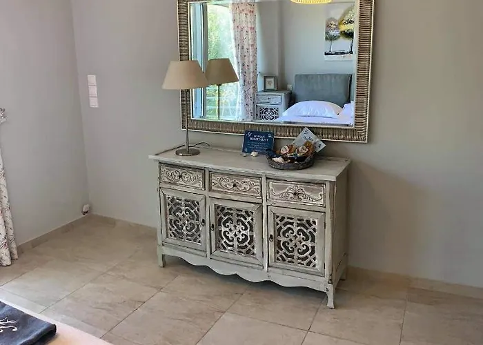 Theosis Casa de Férias